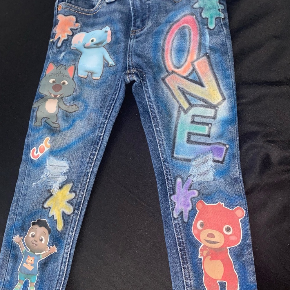 GAP Blue Cartoon-Style Jeans with Distressed Details